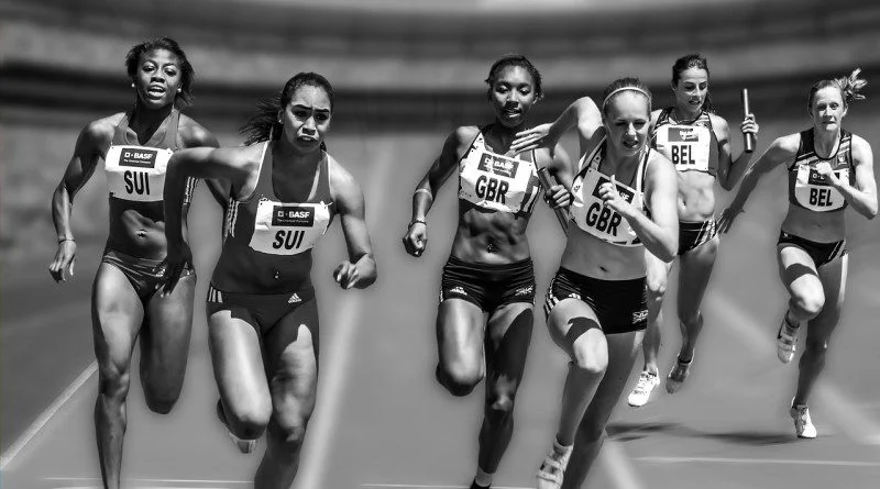 Featured image relay race | buildmywarrior Women running a relay race with great discipline!!